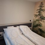 Hálószoba franciaággyal a négyszemélyes apartmanban